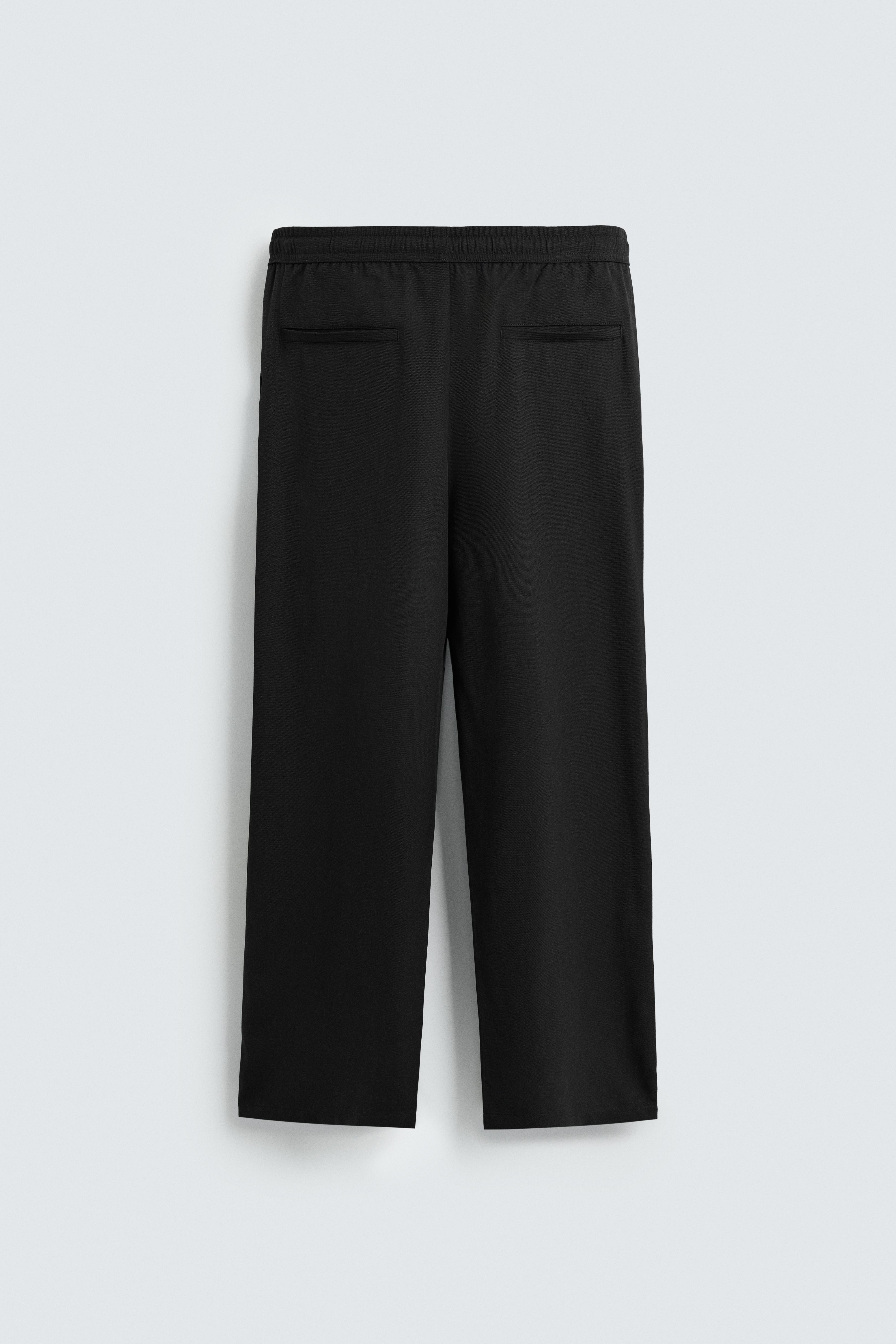 RELAXED FIT FLOWY PANTS